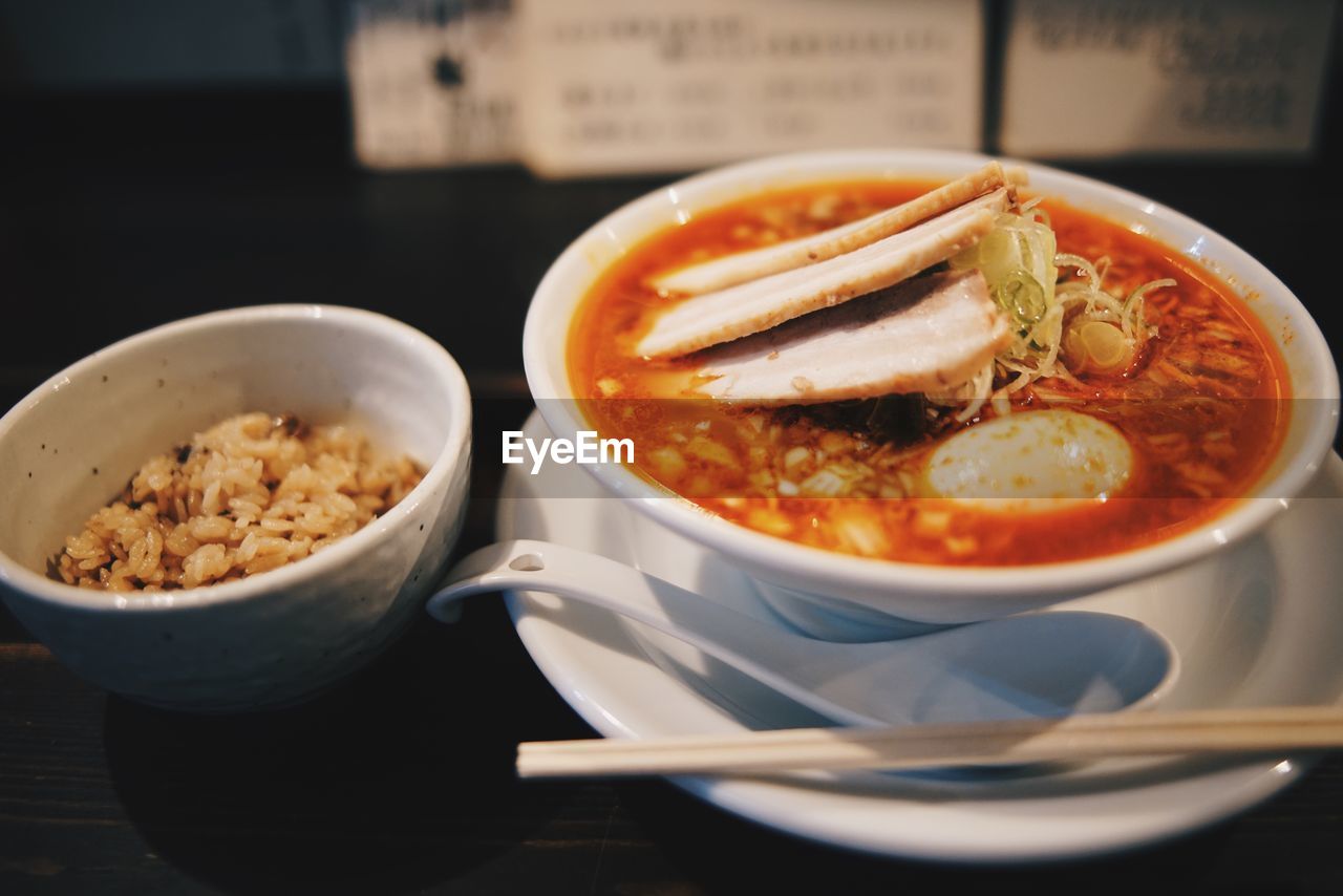 Close-up of soup served on table