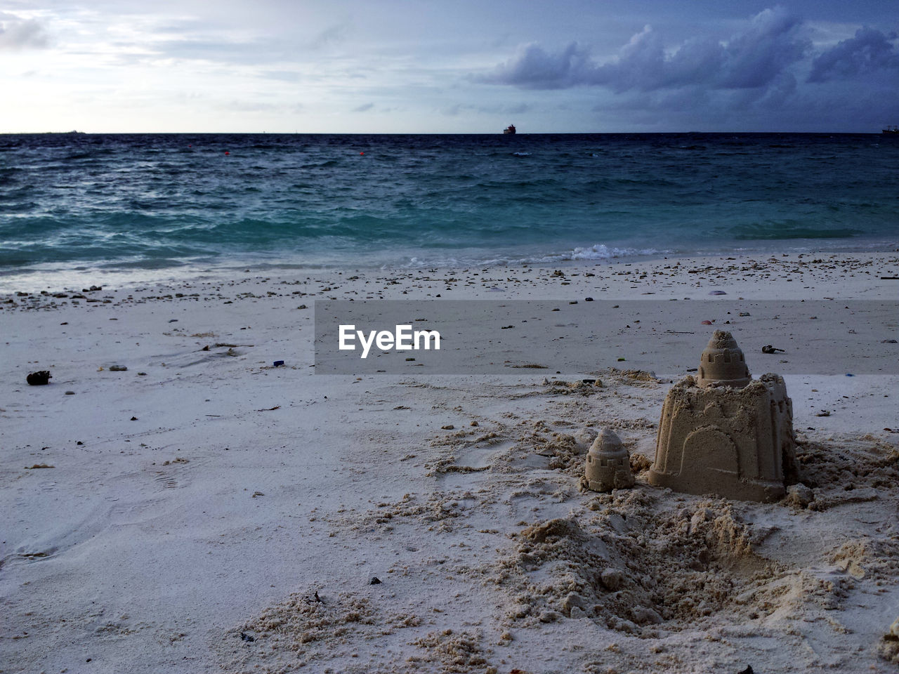 Sand castle on beach