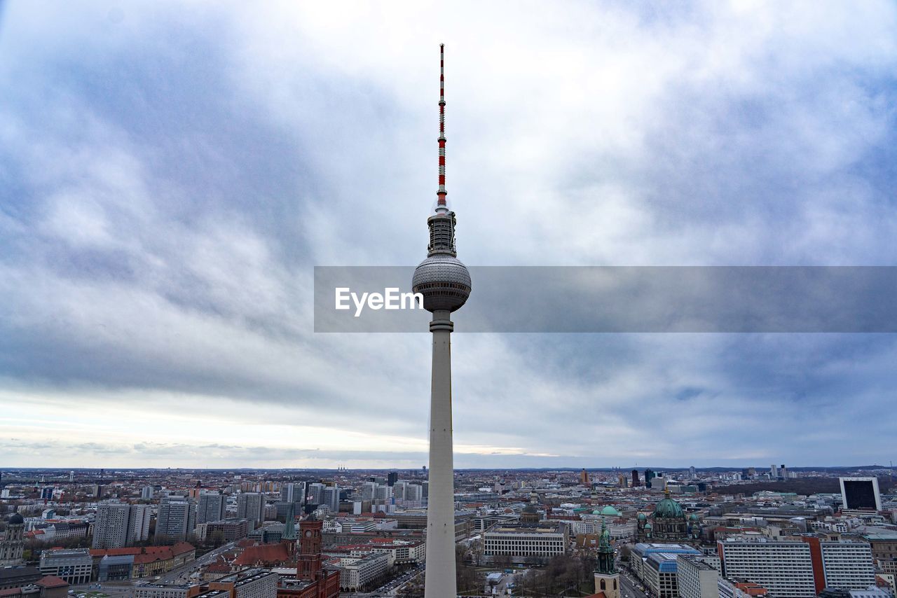 Communications tower in city against sky in berlin