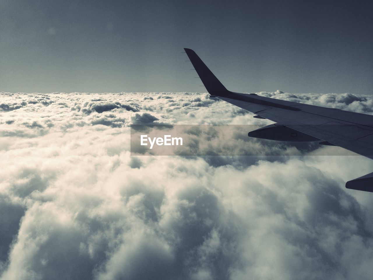 Aircraft wing and cloudscape