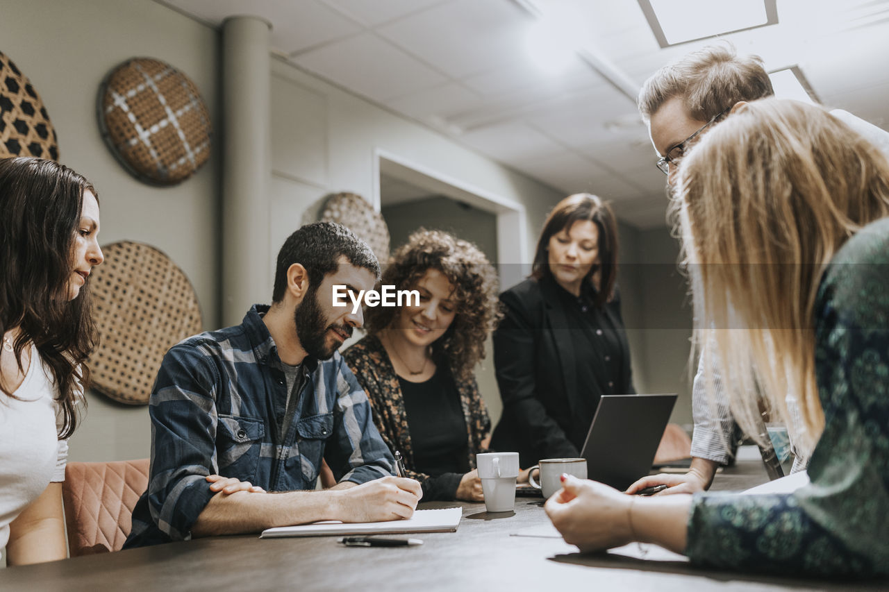 People talking during business meeting