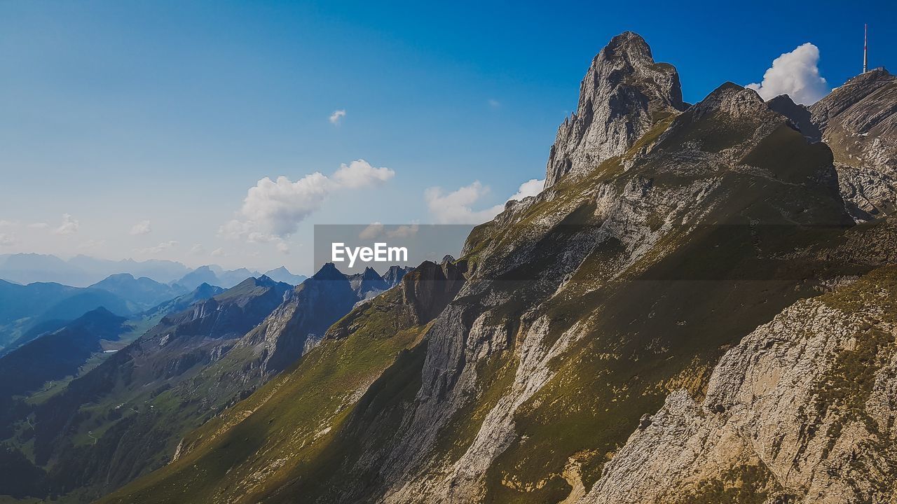 Panoramic view of rocky mountains against sky