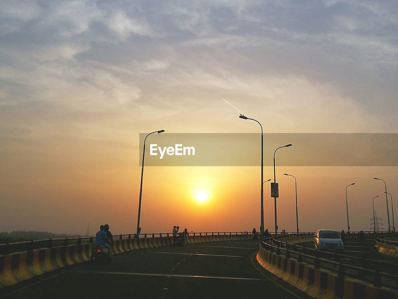 VIEW OF ROAD AT SUNSET