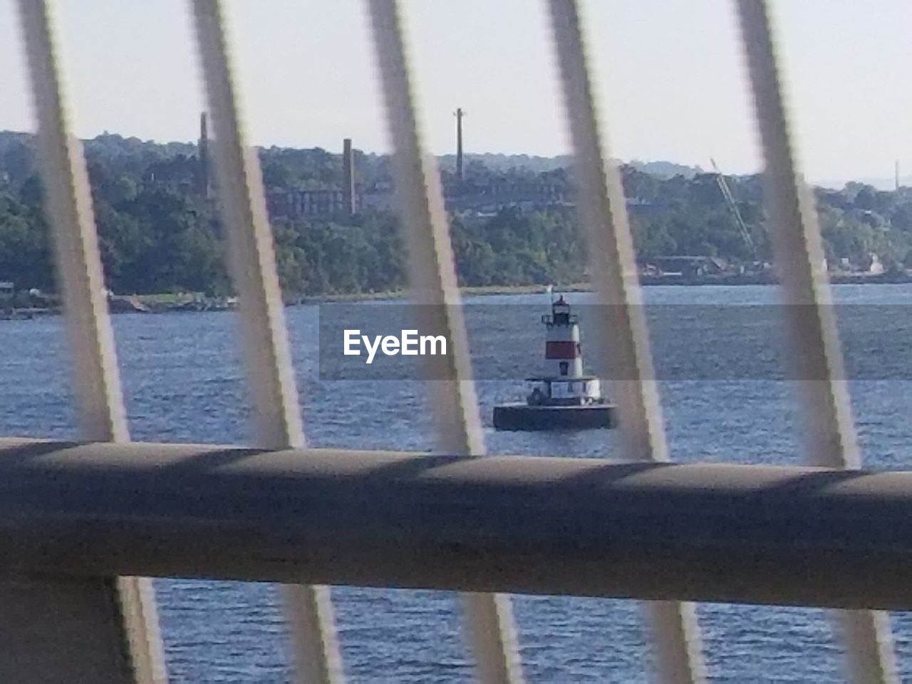 SCENIC VIEW OF SEA AGAINST SKY SEEN THROUGH BOAT