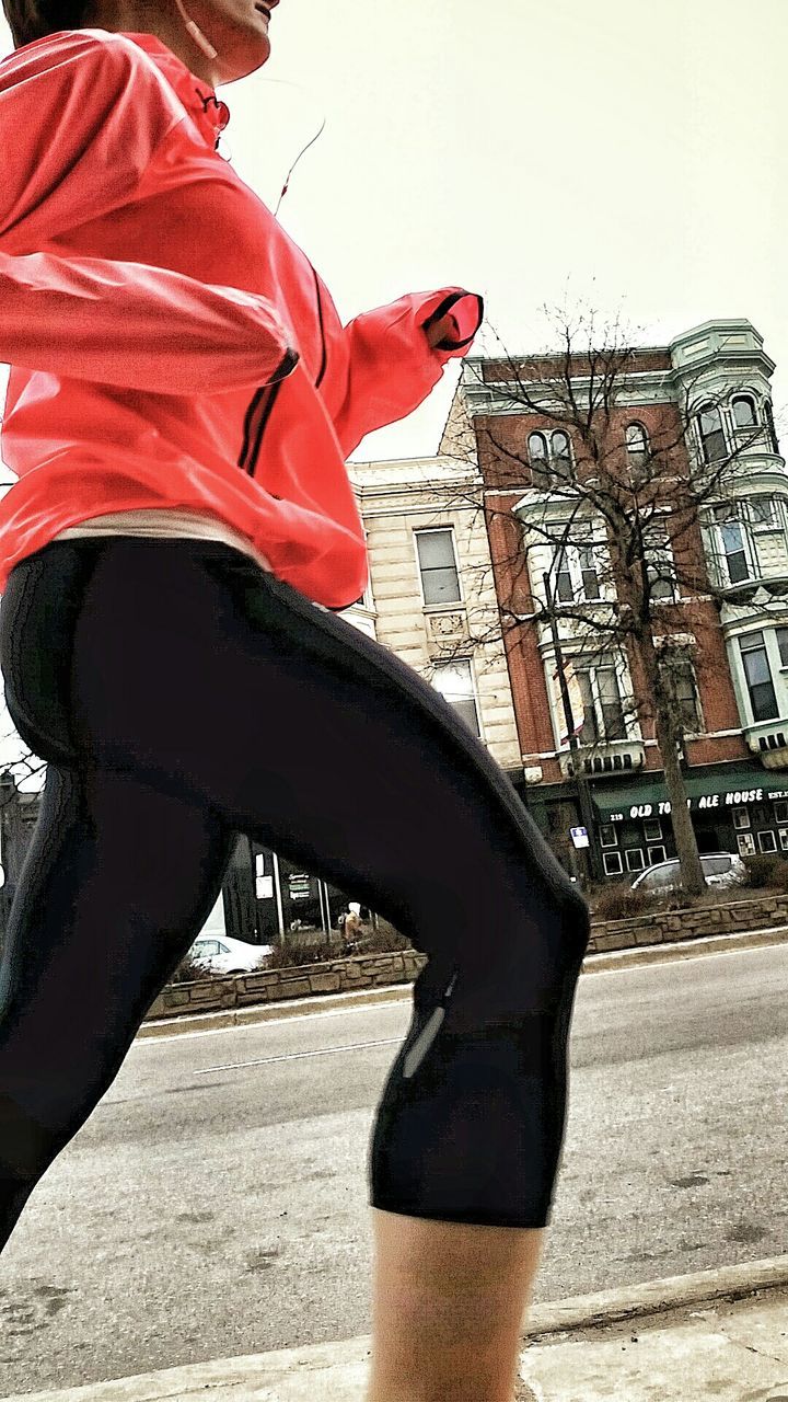 Woman jogging in city