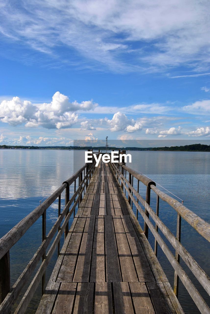 Pier over sea against sky