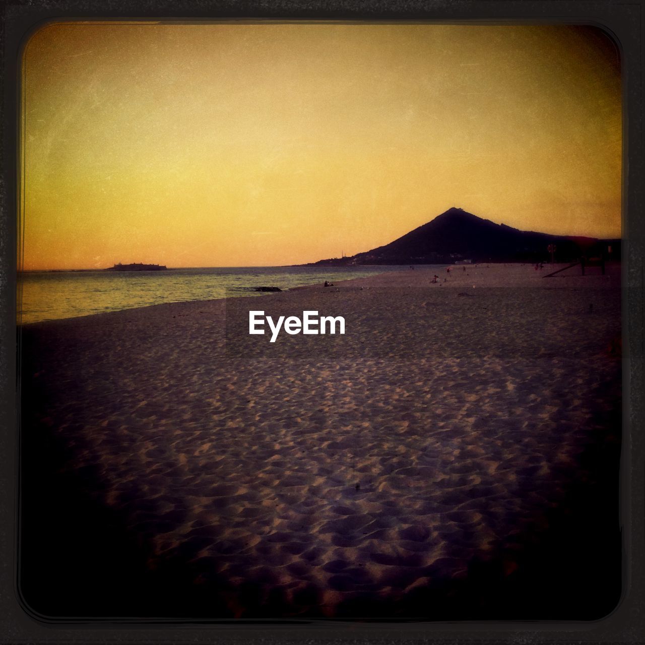 VIEW OF SEA AT SUNSET