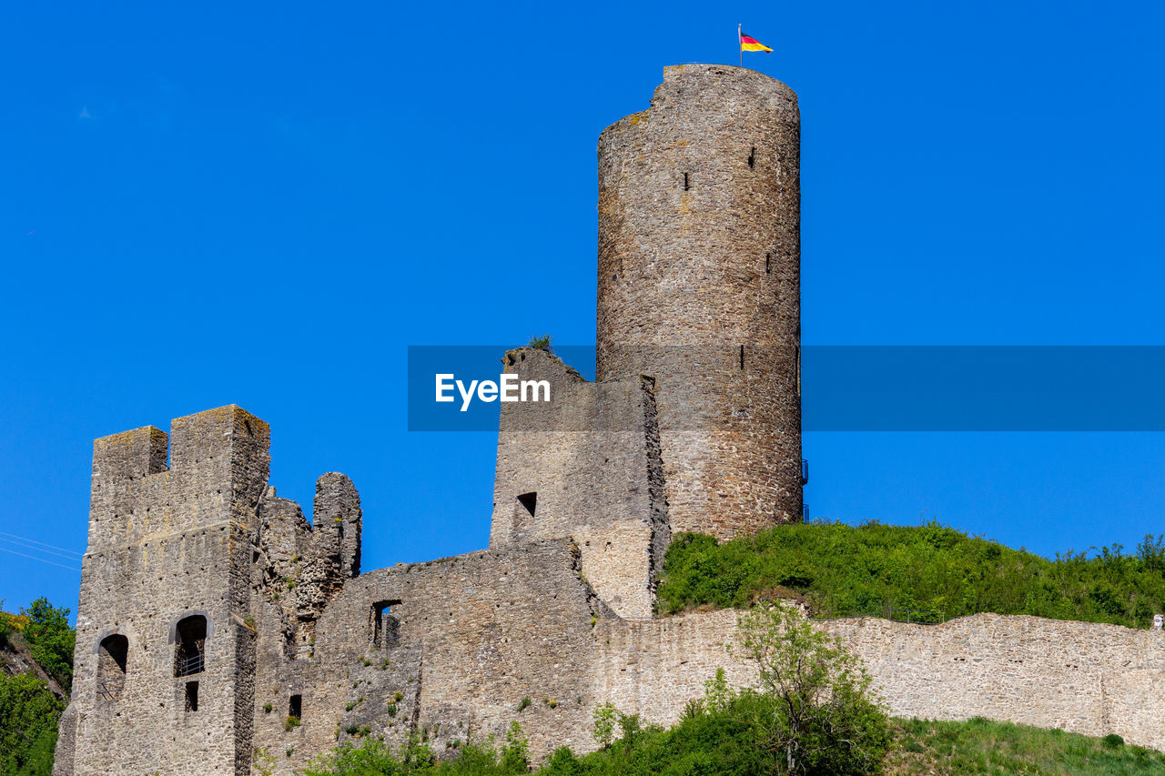 View at the ruin castle monreal or philippsburg in monreal, eifel, germany