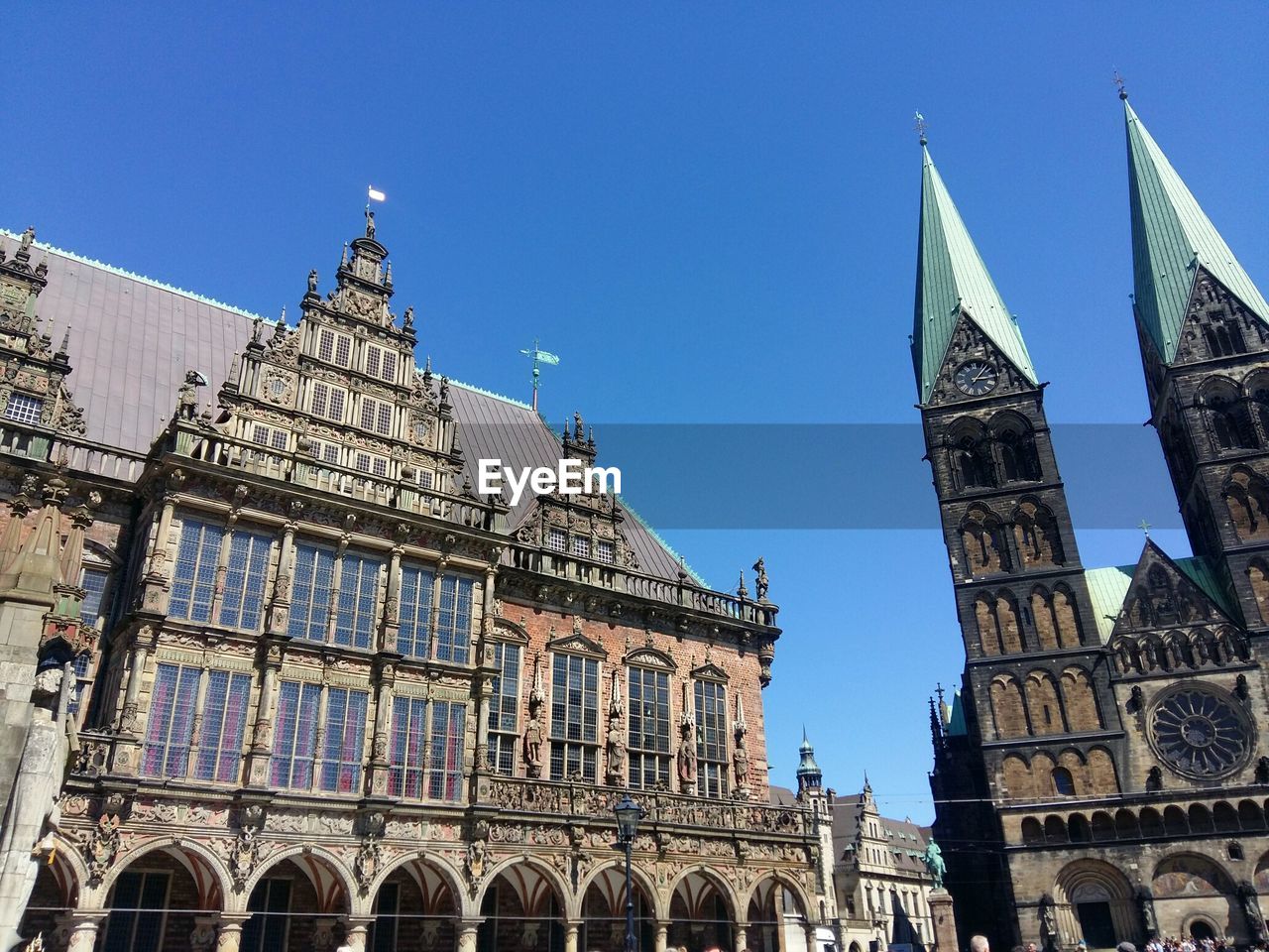 Low angle view of historical building against blue sky