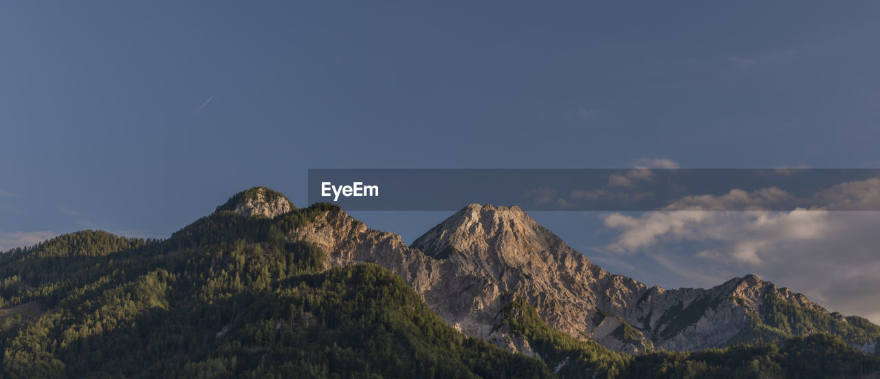 SCENIC VIEW OF ROCKY MOUNTAINS AGAINST SKY