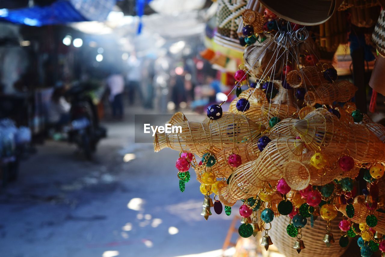 Close-up of decorations for sale at market