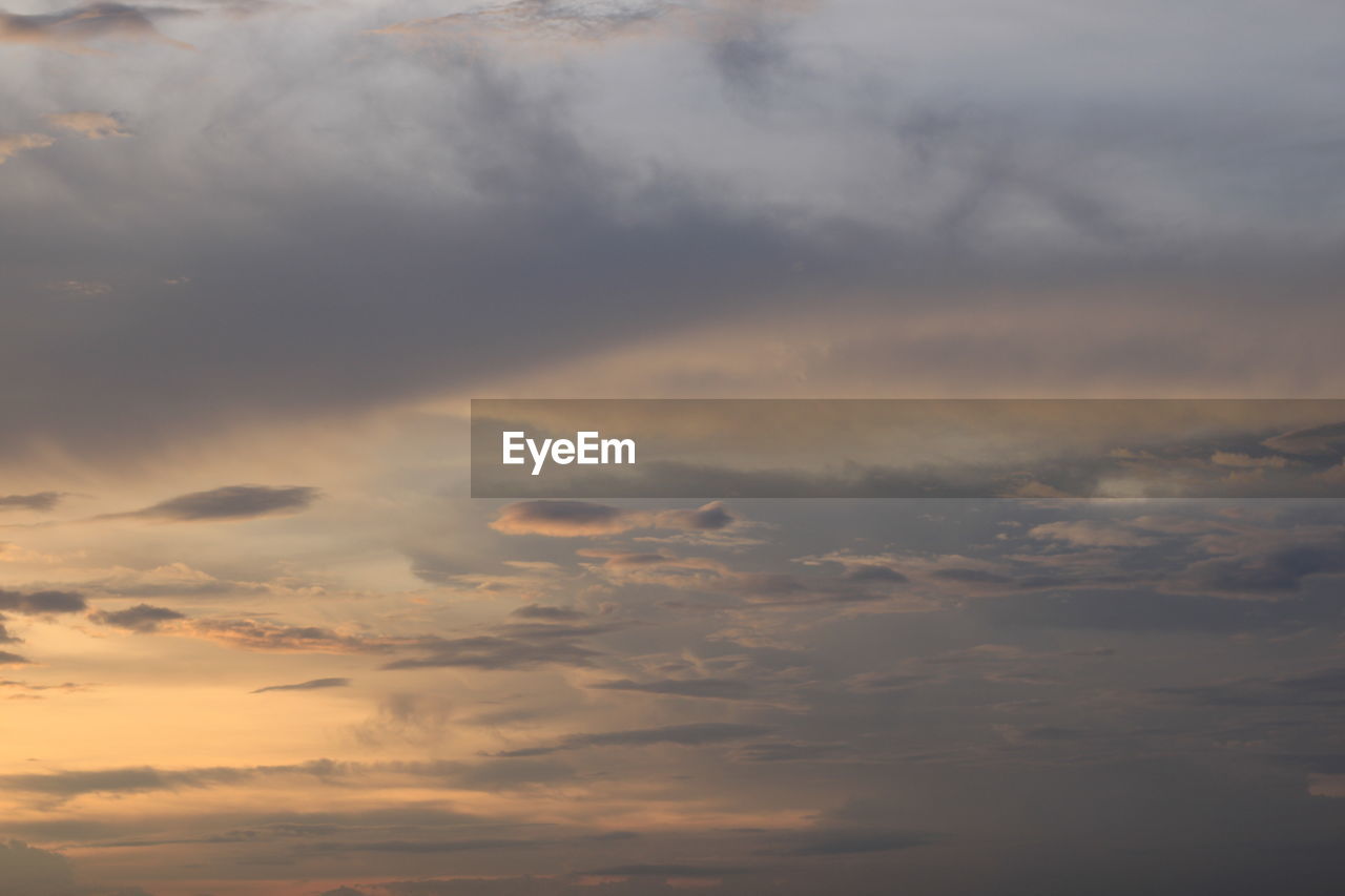 Low angle view of clouds in sky during sunset