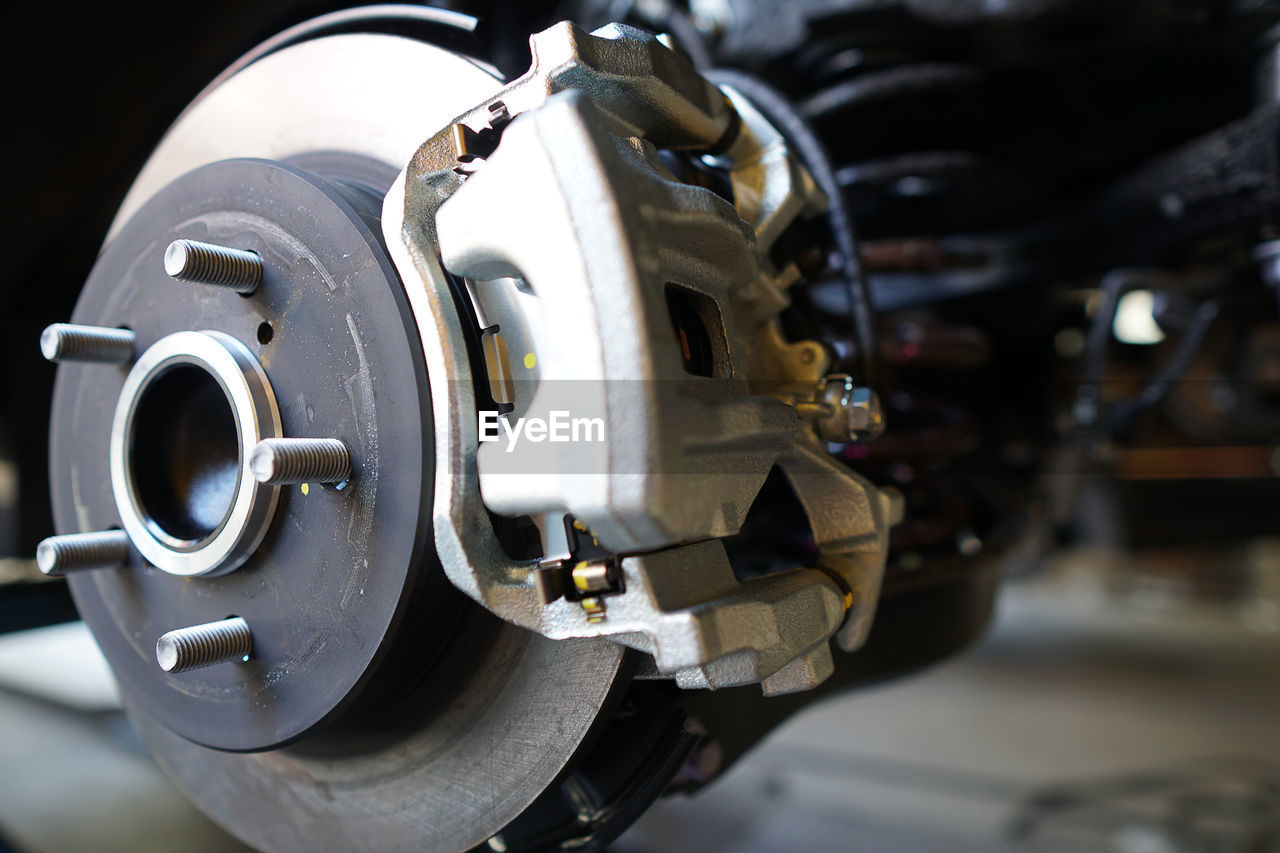 Close-up of vehicle brake at repair shop