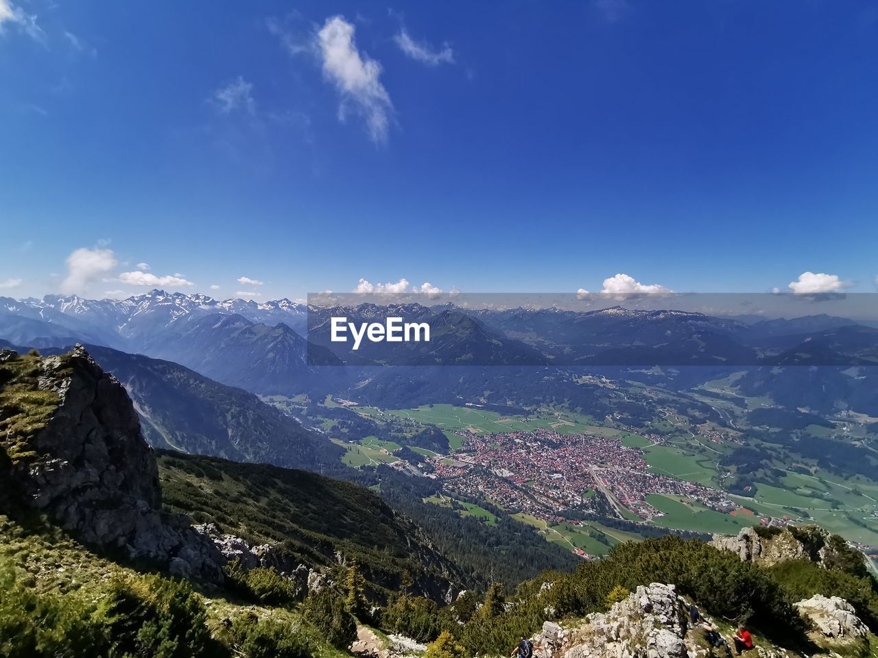PANORAMIC VIEW OF LANDSCAPE AGAINST BLUE SKY