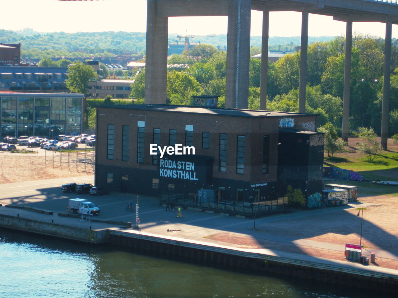 VIEW OF SWIMMING POOL BY BUILDING