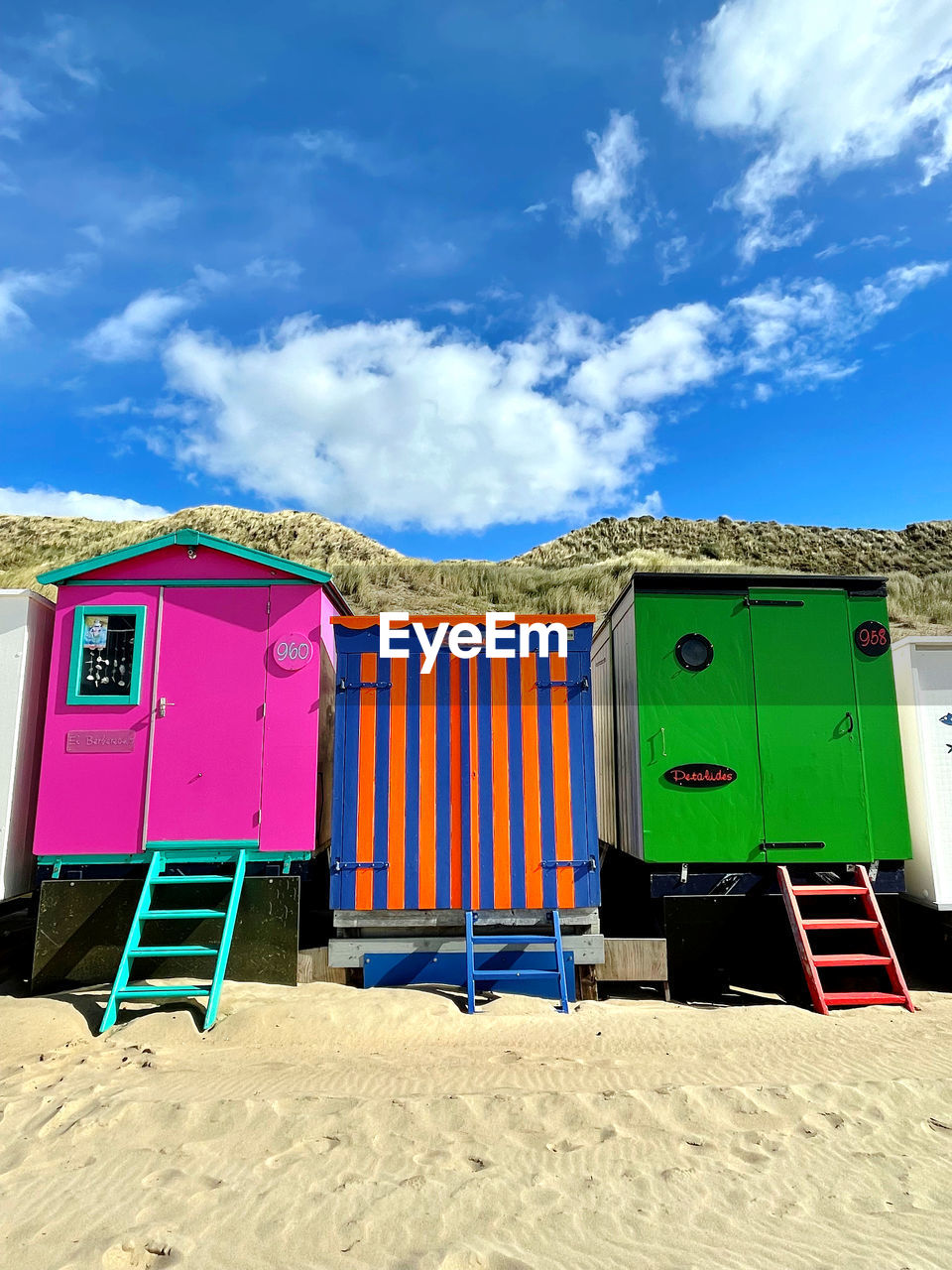 Colorful tiny houses at the beach