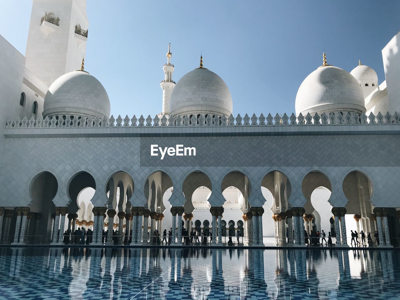 VIEW OF MOSQUE AGAINST BUILDINGS