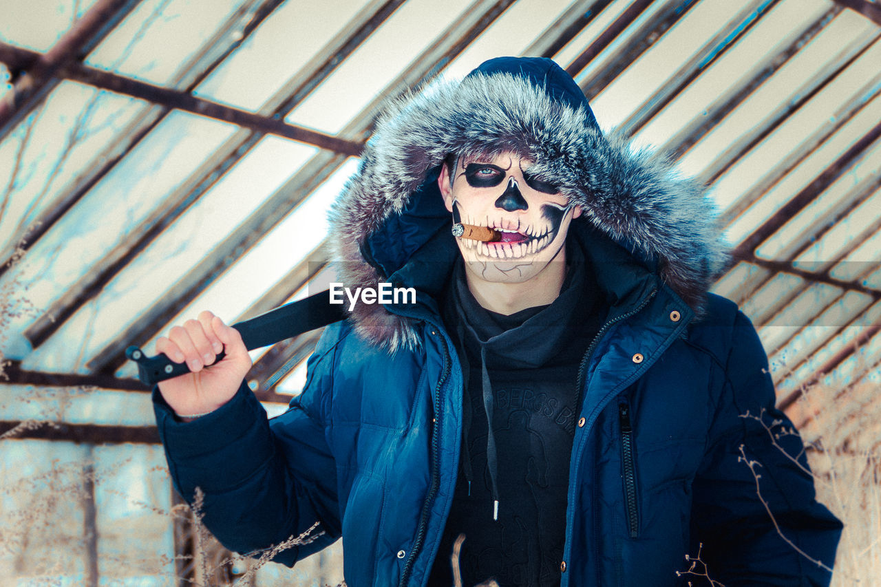 Portrait of a man with spooky make-up