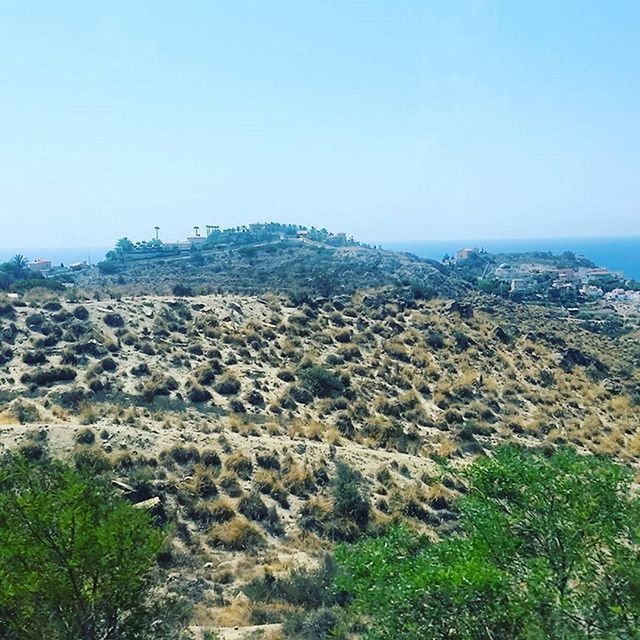 SCENIC VIEW OF MOUNTAINS AGAINST CLEAR BLUE SKY