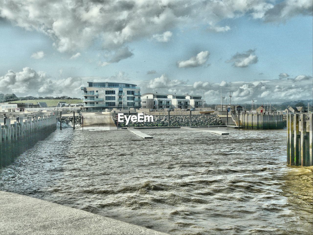 VIEW OF CLOUDY SKY OVER CITY