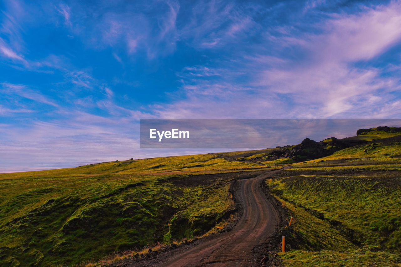 Dirt road landscape sunset 