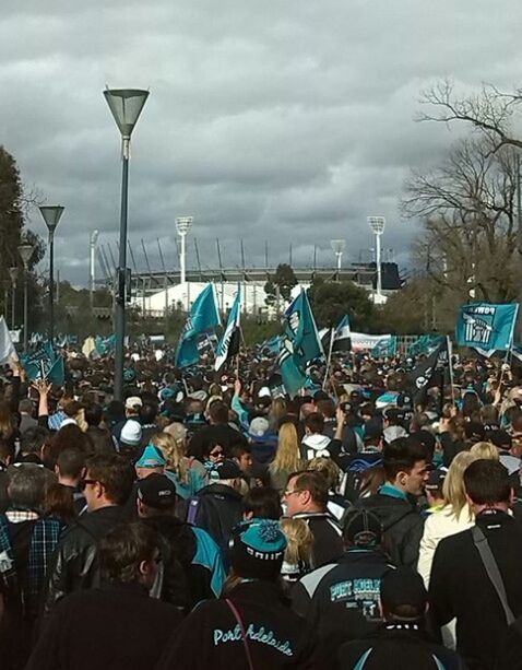 GROUP OF PEOPLE IN STADIUM