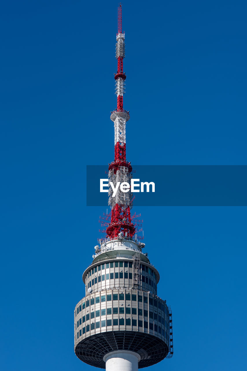 tower, blue, architecture, built structure, communications tower, skyscraper, sky, clear sky, building exterior, no people, communication, nature, technology, city, travel destinations, broadcasting, travel, building, copy space, office building exterior, outdoors, global communications, metal, vehicle, low angle view, tourism