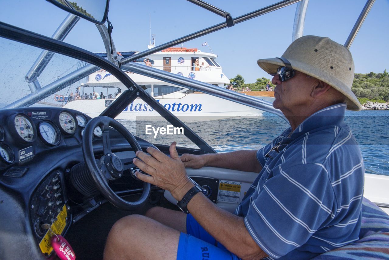 VIEW OF SEA THROUGH VEHICLE