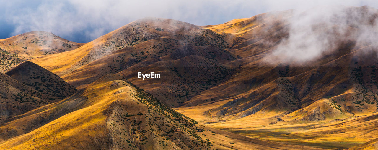 PANORAMIC VIEW OF SNOWCAPPED MOUNTAINS