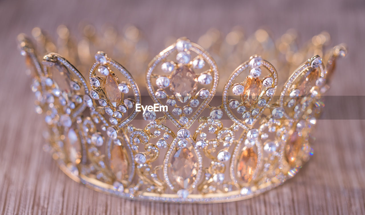 Close-up of crown on table