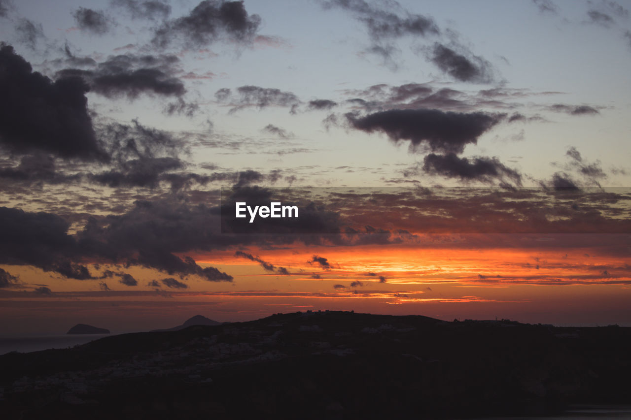 SCENIC VIEW OF DRAMATIC SKY AT SUNSET