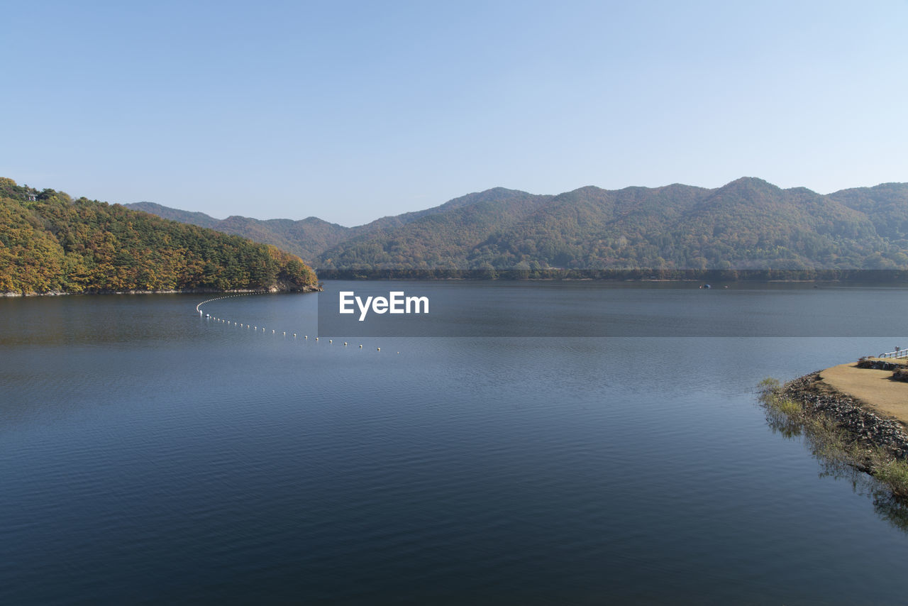 View of lake against mountain range