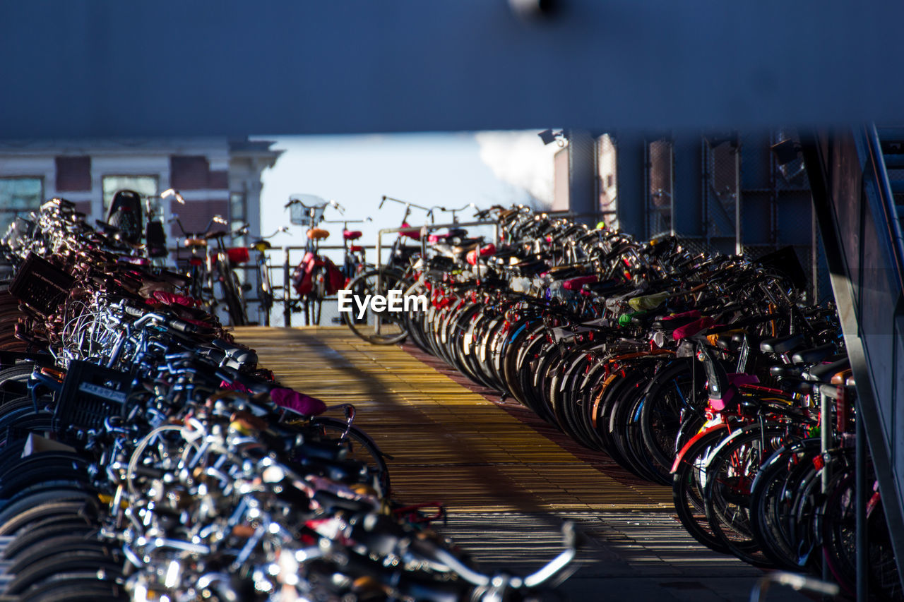 BICYCLES IN PARKING LOT IN CITY