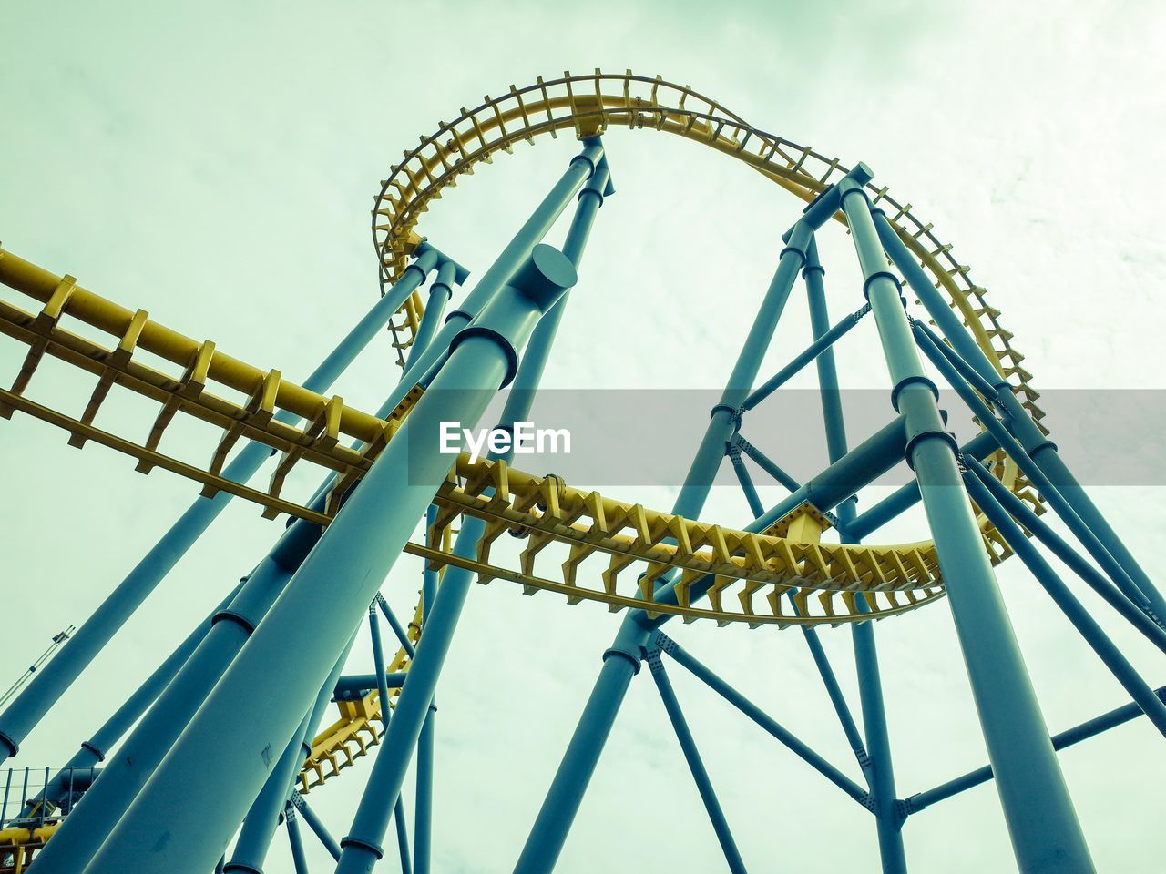 Low angle view of rollercoaster against sky