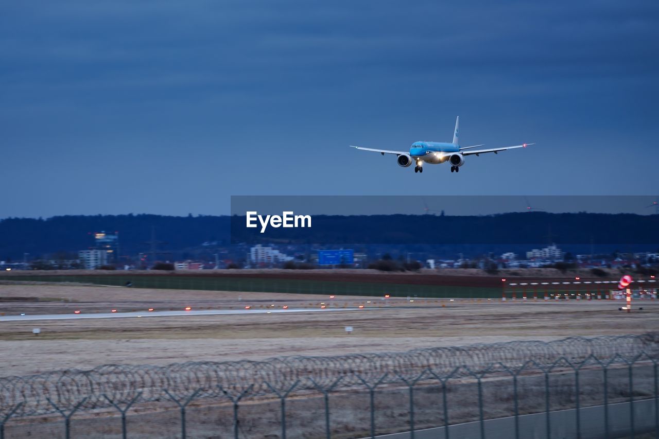 air vehicle, transportation, airplane, mode of transportation, airport runway, airport, flying, sky, travel, aviation, vehicle, aircraft, taking off, nature, airliner, landing, motion, mid-air, air force, aerospace industry, outdoors, arriving, travel destinations, blue, on the move, no people