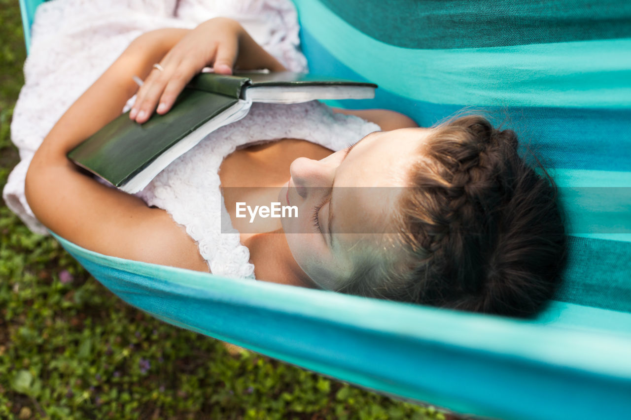 High angle view of woman using mobile phone