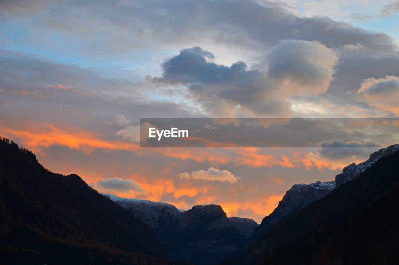 Scenic view of mountains against sky during sunset