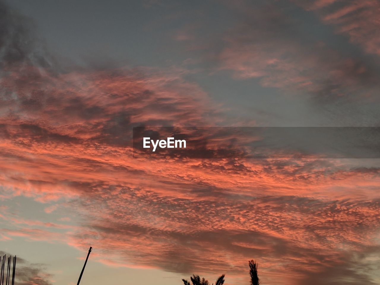 LOW ANGLE VIEW OF CLOUDY SKY DURING SUNSET