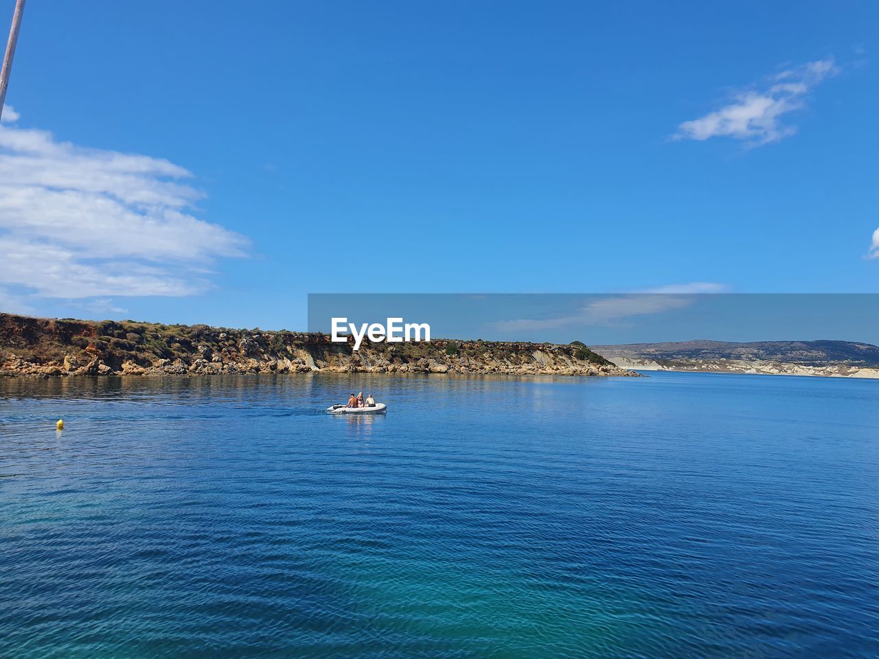 SAILBOATS IN SEA AGAINST SKY