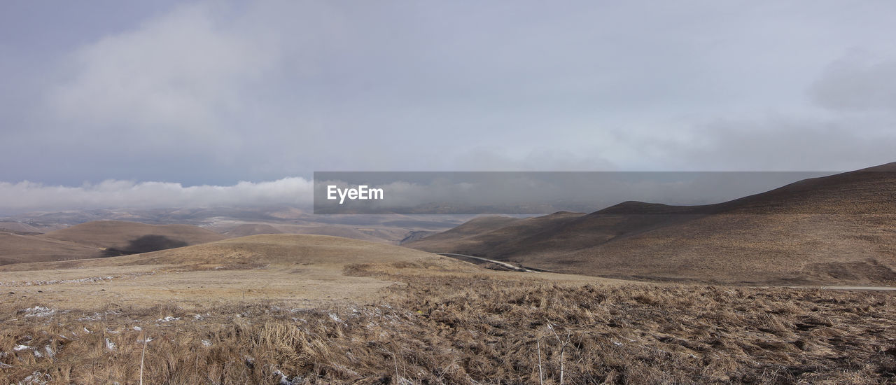 SCENIC VIEW OF LAND AGAINST SKY