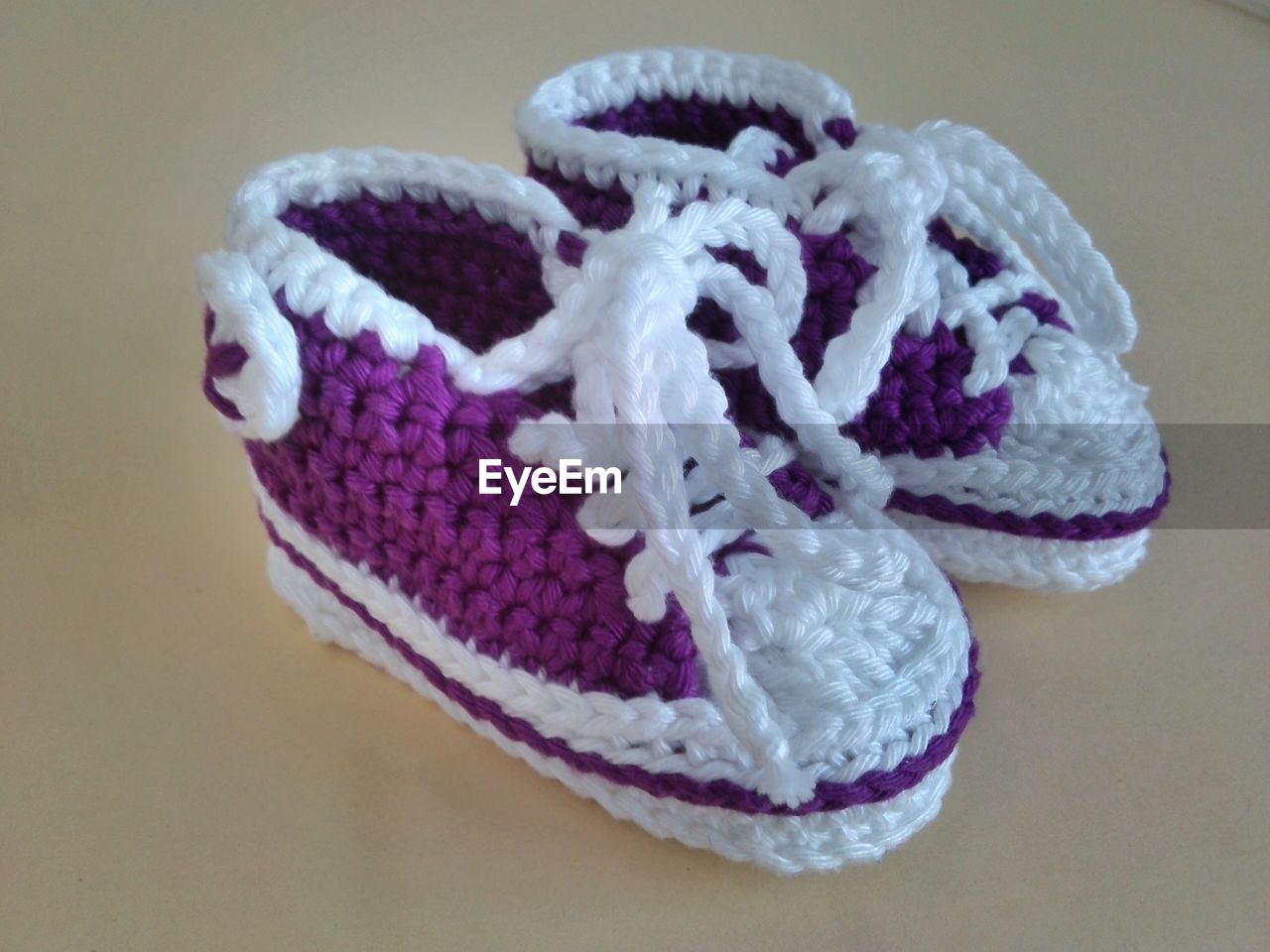 Close-up of woolen baby booties