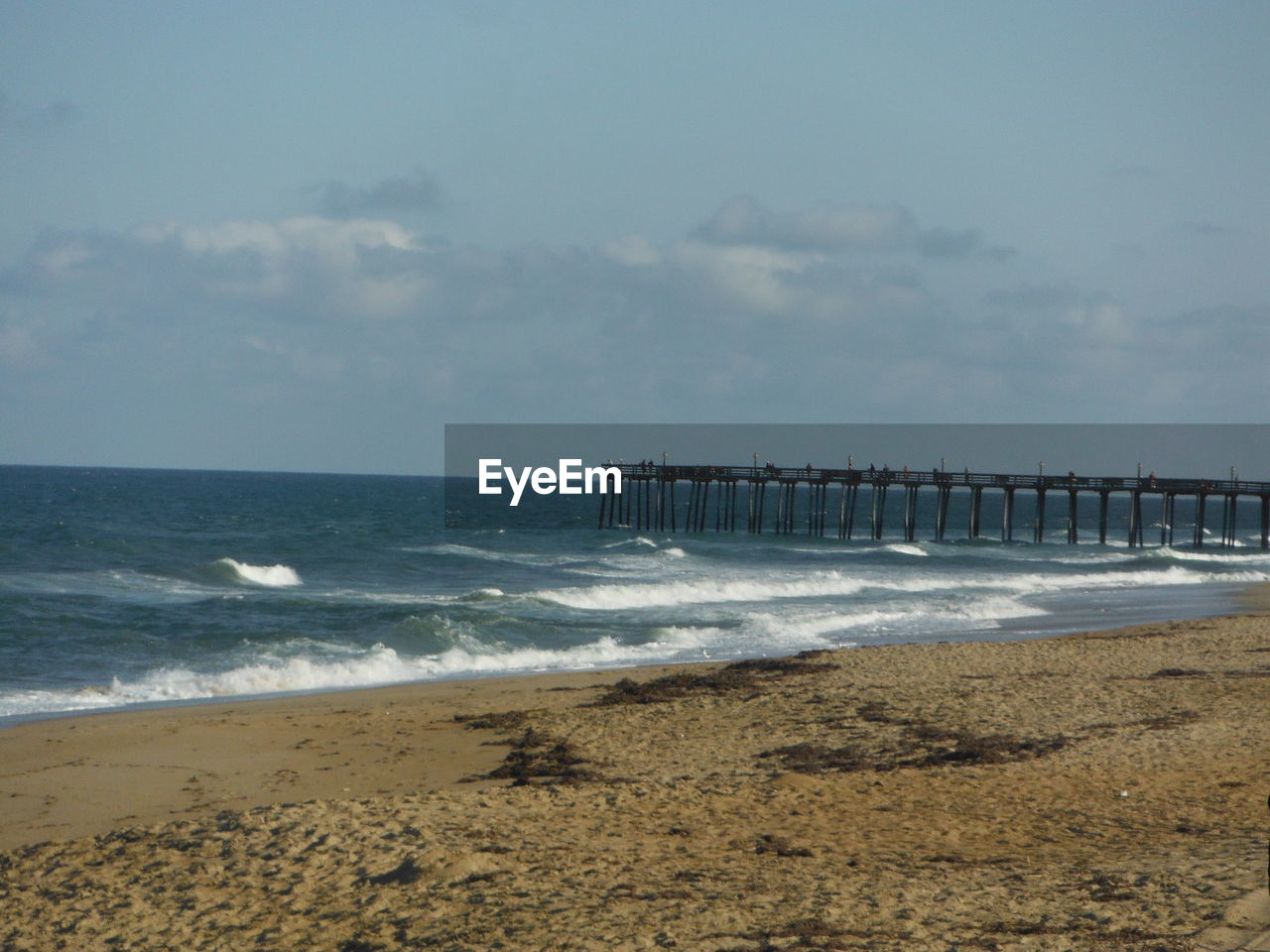 VIEW OF BEACH AGAINST SKY