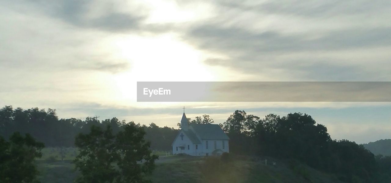 VIEW OF CLOUDY SKY OVER BUILDINGS