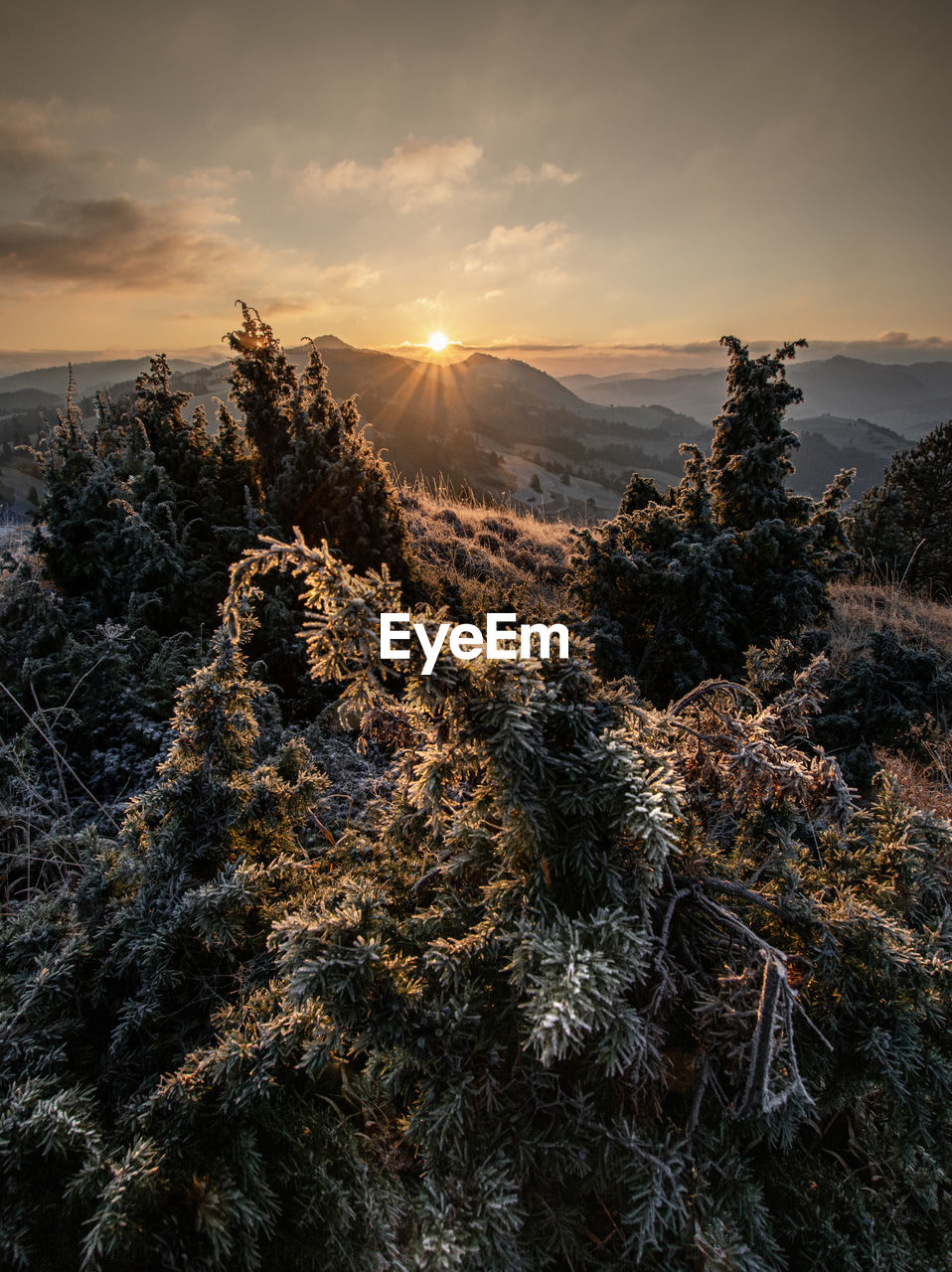 Scenic view of mountain against sky during sunset