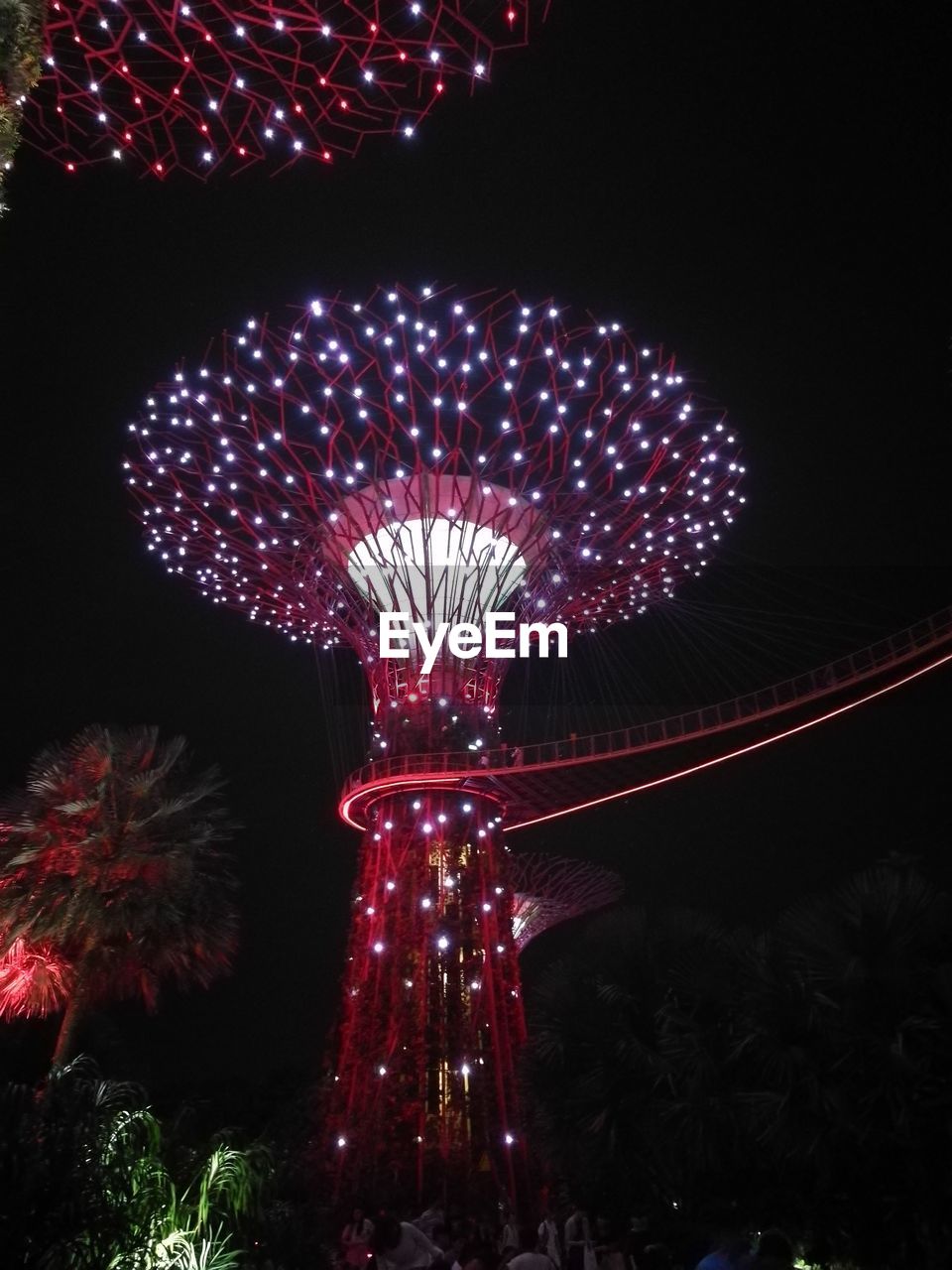 LOW ANGLE VIEW OF ILLUMINATED FERRIS WHEEL