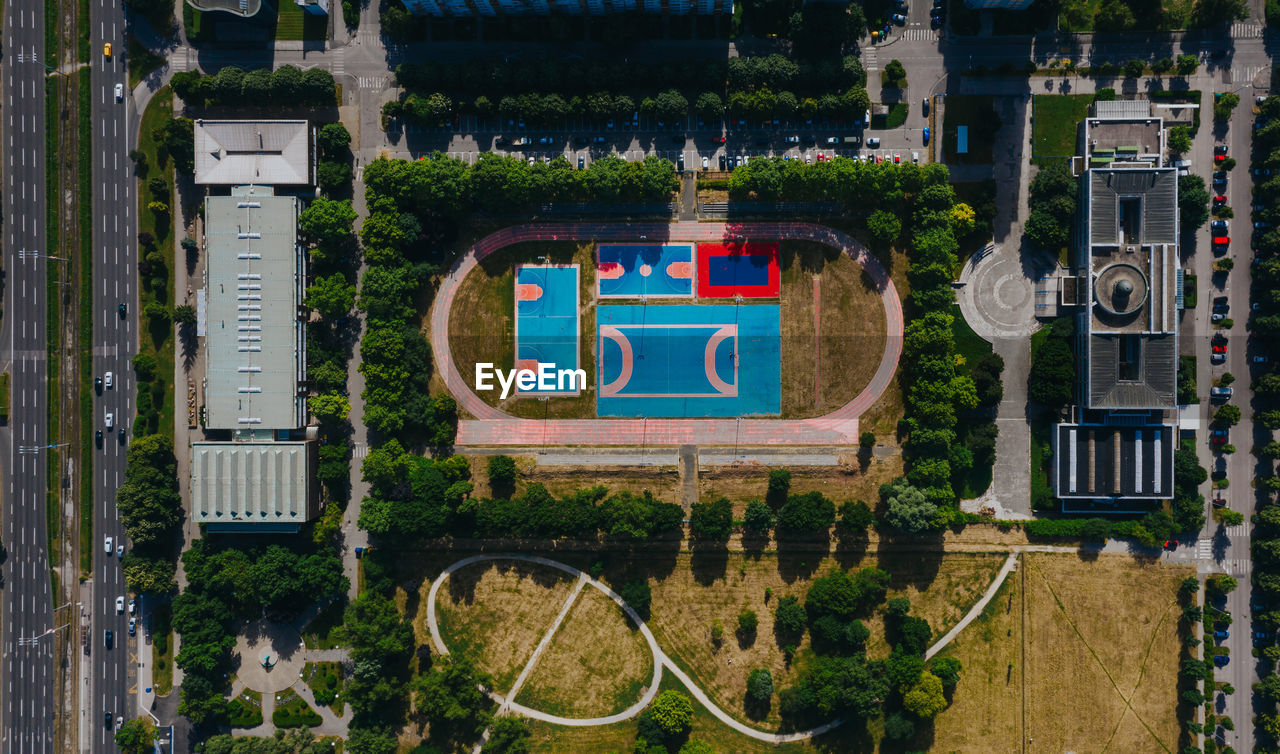 Drone view on sport playground between the buildings