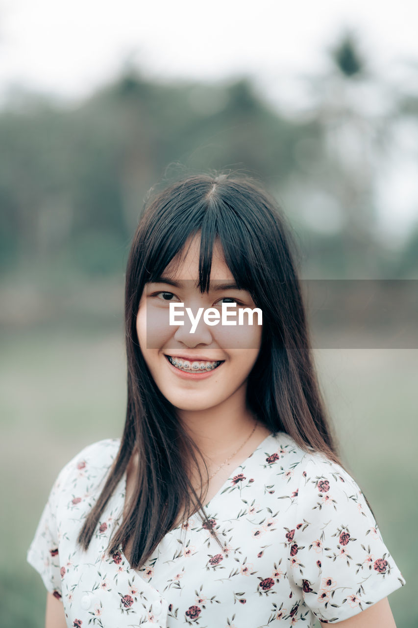 Portrait of a smiling young woman