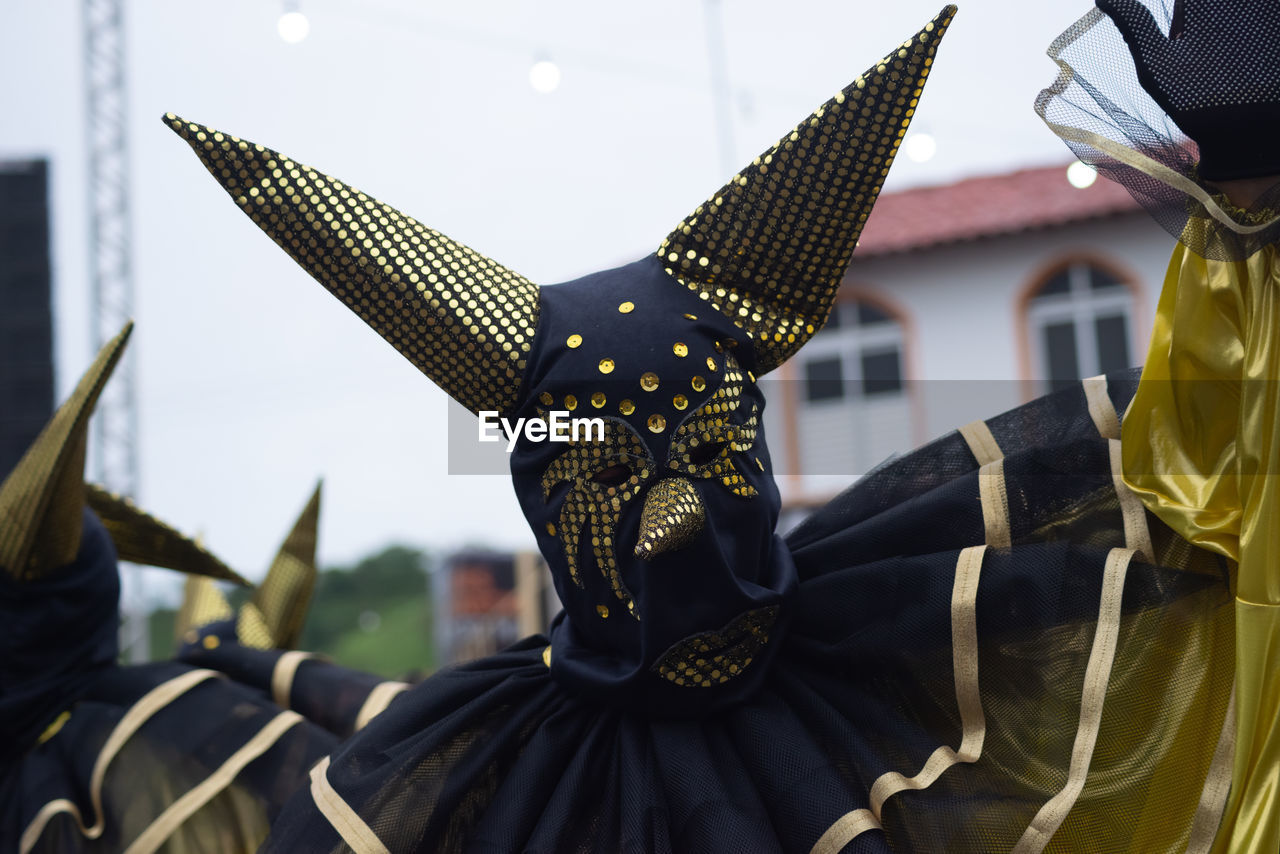 People dressed in venice carnival style are seen during the carnival