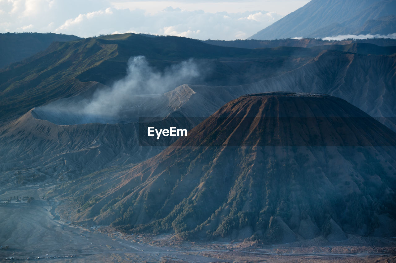 Smoke emitting from volcanic mountain in mount bromo indonesia