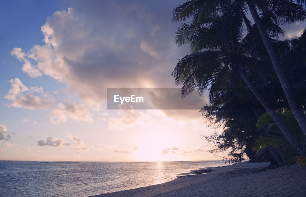 Scenic view of sea against sky at sunset